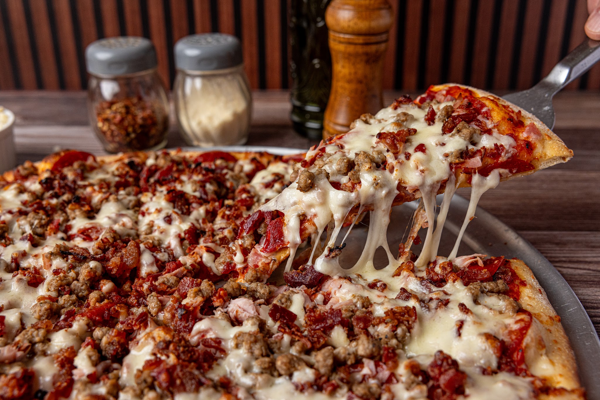 Loaded 54 Pizza pie with a cheese pull